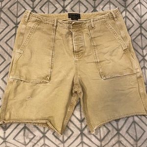 Abercrombie & Fitch distressed tan shorts.